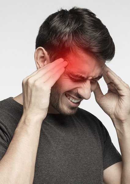 Man suffering from painful headache