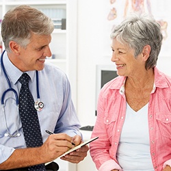 doctor talking to patient about osteopathic manipulation