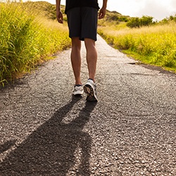 man walking after osteopathic manipulation 