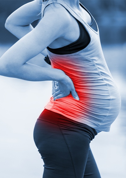 Woman experiencing perinatal back pain