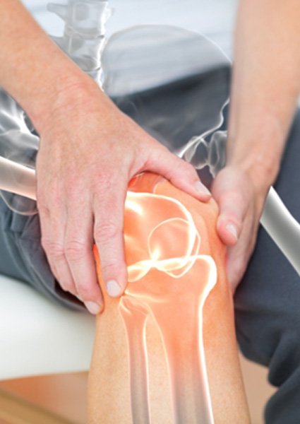 Person with aching knee, may benefit from Prolozone injections