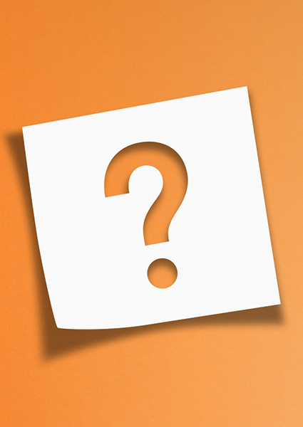 Sticky note with question mark against orange background